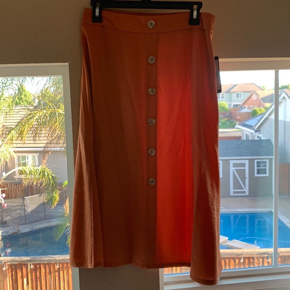 Orange A Line skirt with buttons